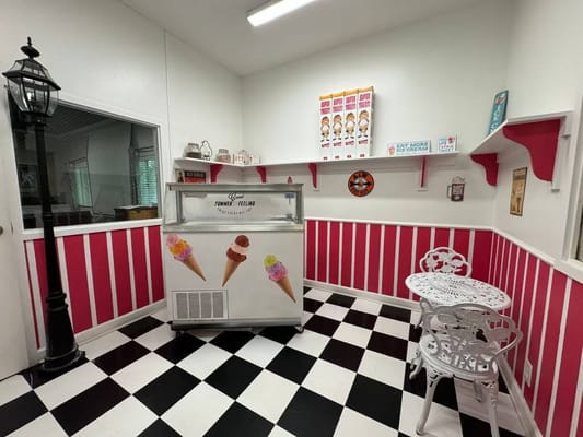 Ice cream parlor with colorful walls and seating