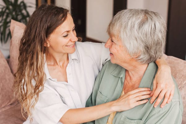 Caregiver interacting with a senior resident