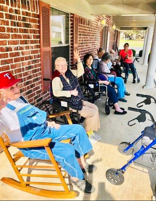 Residents enjoying time on the porch