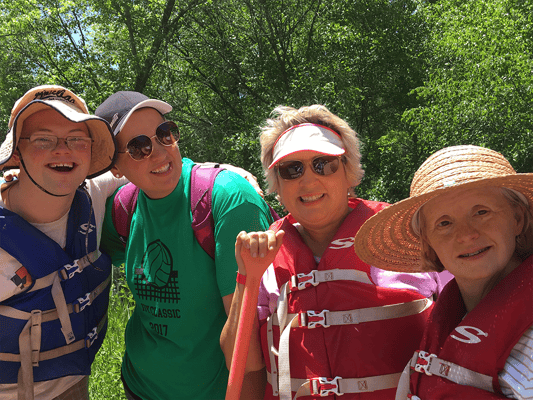 Residents and staff enjoying an outdoor activity