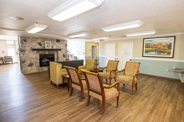 Interior view of a cozy common area with seating