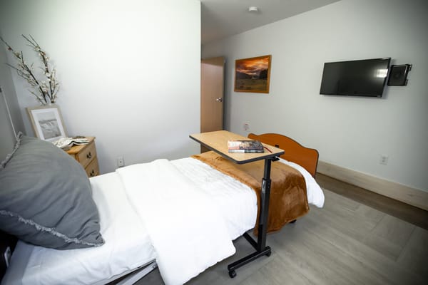 Cozy private resident room with a bed and decor