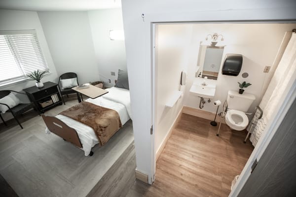Private resident room with bathroom in a nursing facility