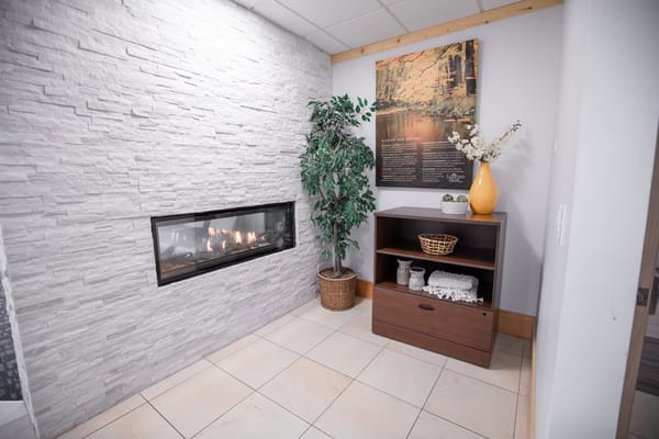 Cozy interior corner with a fireplace and decorations