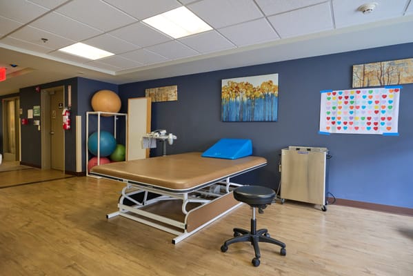 Interior view of a therapy room with equipment