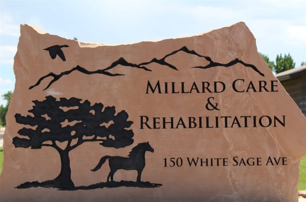 Facility logo on natural stone monument