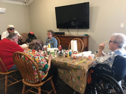 Residents engaged in a creative activity session