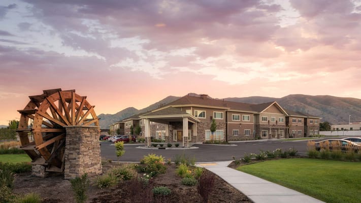 Exterior view of The Ashford of Springville at sunset