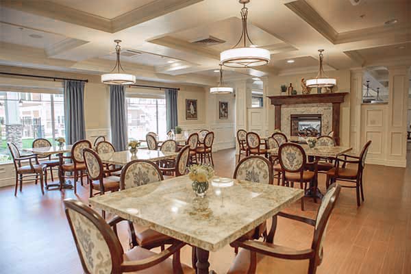 Bright dining room with tables and chairs