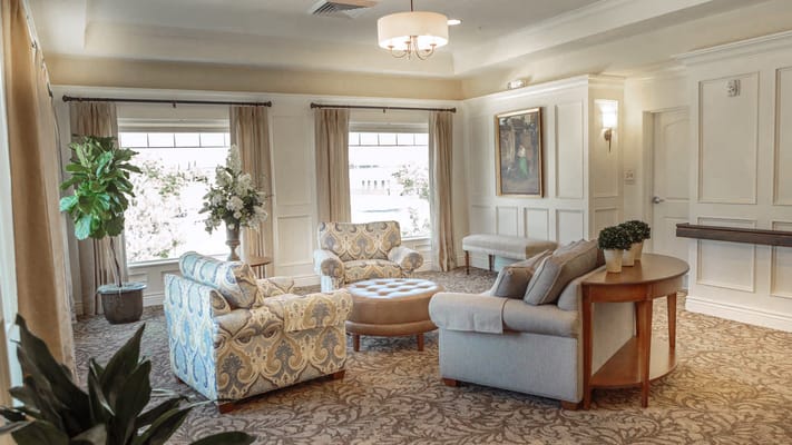 Comfortable common area with seating and natural light