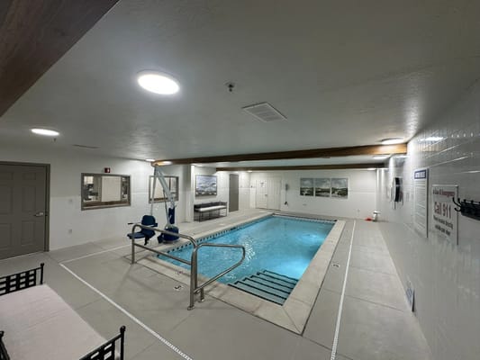 Indoor swimming pool area with accessible features