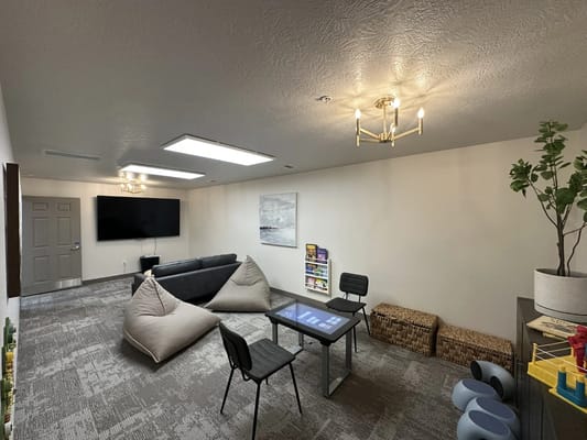Interior common area with seating and games