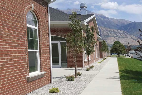 Exterior view of the assisted living facility with landscaping
