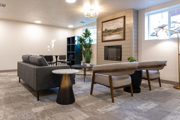 Cozy common area with modern furnishings and fireplace