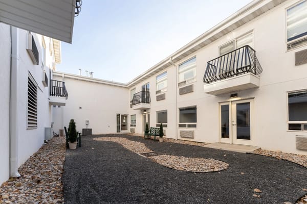 A landscaped outdoor space with pathways and seating