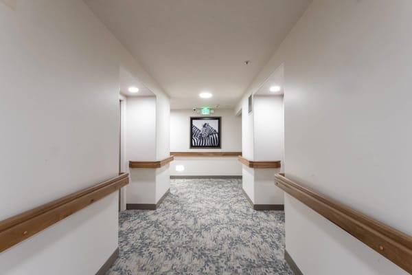Interior hallway with artwork on the wall