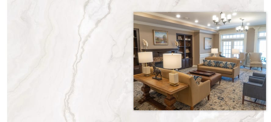 Bright common area with comfortable seating and artwork