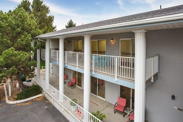 Exterior view of a senior living facility with balconies