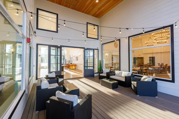 Lounge area with seating and decorative lights