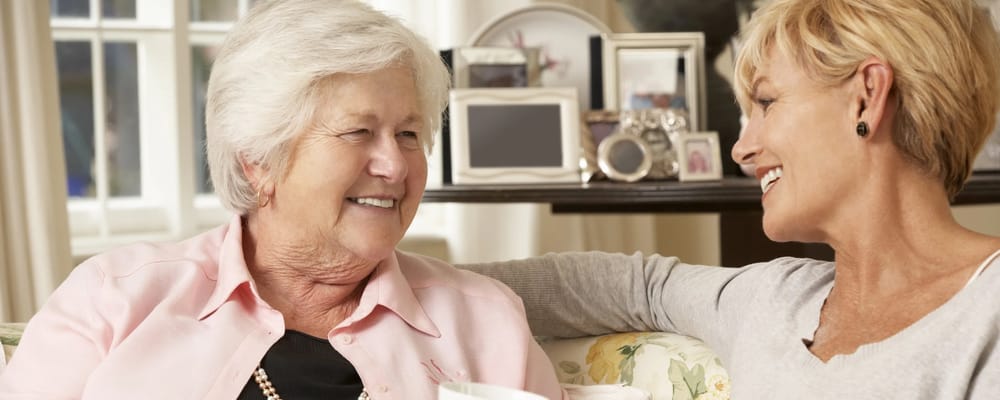 Residents enjoying a conversation in a common area