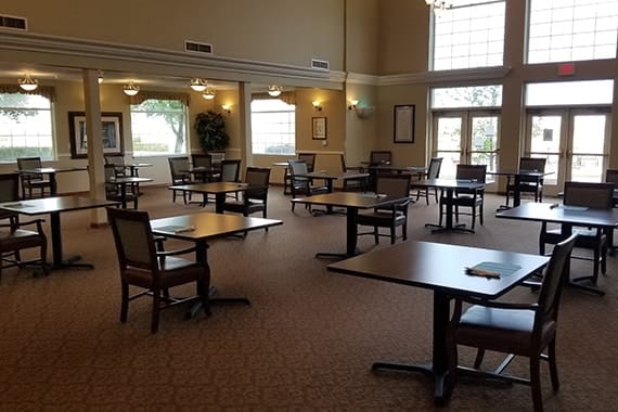 Interior dining area with tables and chairs