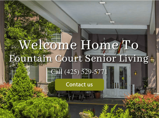 Entrance of Fountain Court Assisted Living with landscaping