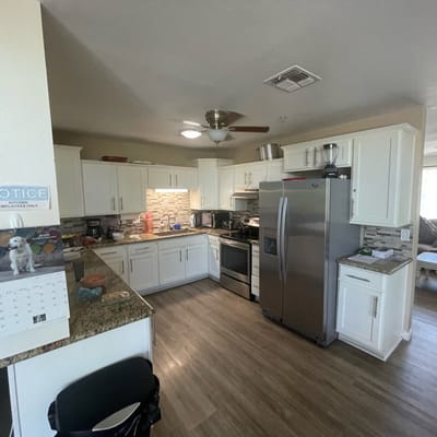 Bright kitchen area with modern appliances