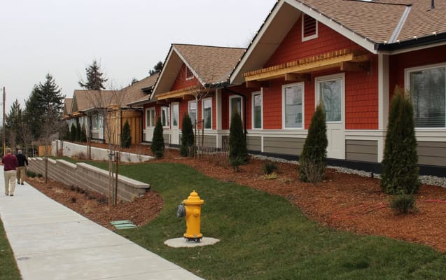 Exterior view of the cottages with a pathway