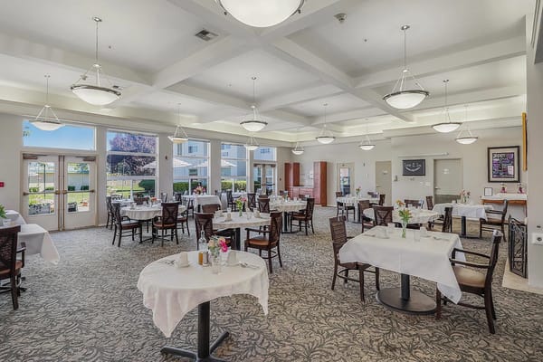 Well-decorated dining room set for residents