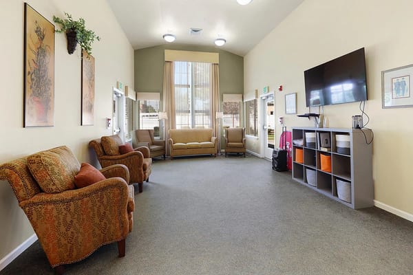 Common area with seating and a television