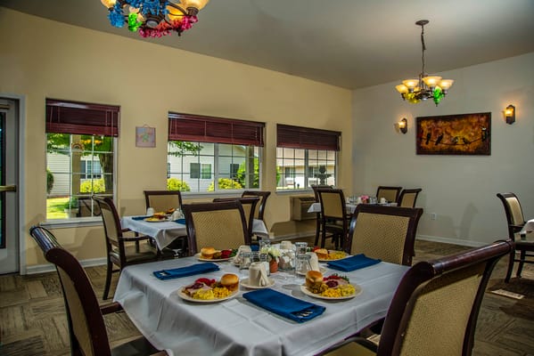Dining area with tables set for a meal
