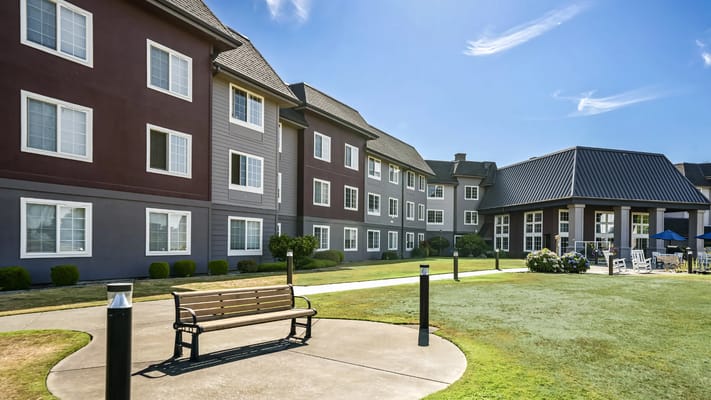 Exterior view of Meadow Greens with landscaping