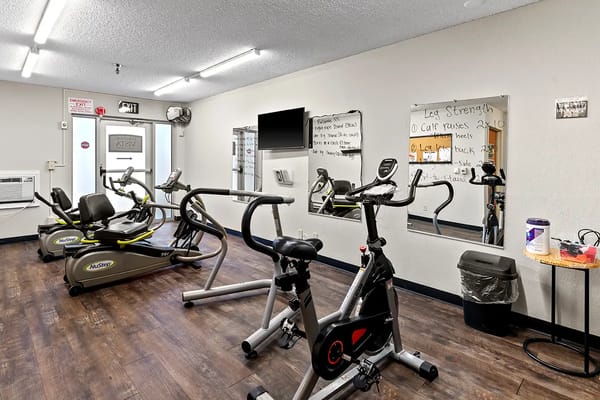 Interior view of a fitness area with exercise equipment