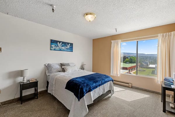 Bright and airy bedroom with window view