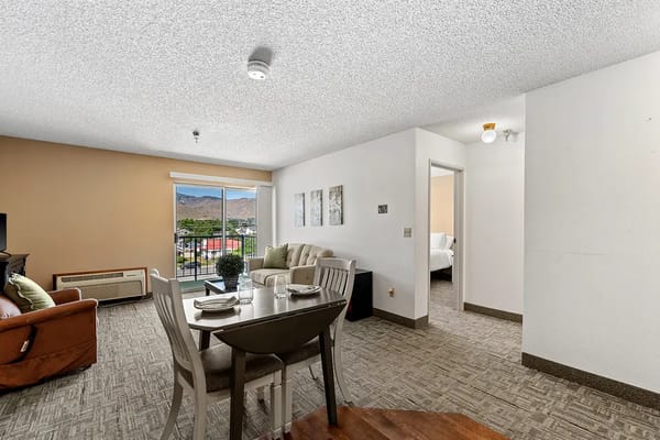 Bright interior view of a resident suite with furniture