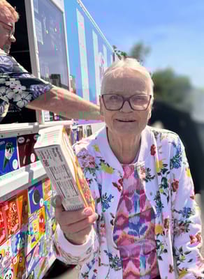 Resident enjoying an ice cream treat from an ice cream truck