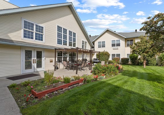 Well-maintained garden and patio area of the facility