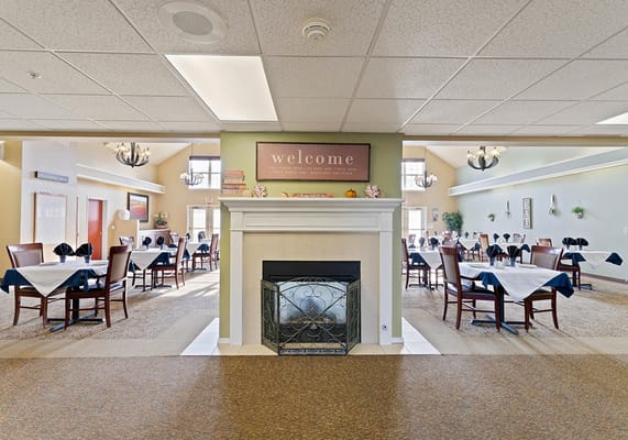 Dining area with tables set for residents