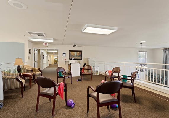 Activity area with chairs and equipment for exercises