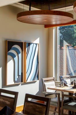 Dining area with modern decor and natural lighting