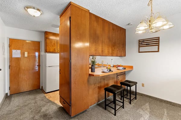 Interior view of a small kitchen in a senior living unit