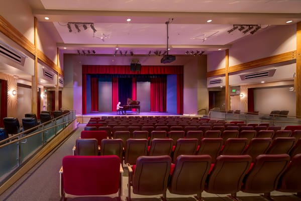 Interior view of a performance space with seats