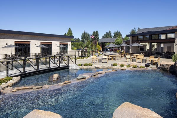 Outdoor courtyard with a water feature and seating