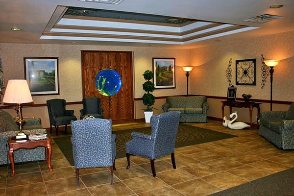 A cozy lobby area with seating and decor