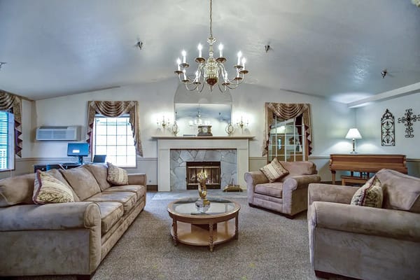 Cozy common area with comfortable seating and a fireplace