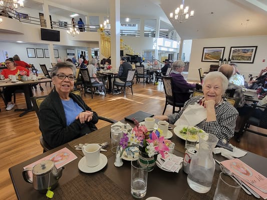 Residents enjoying a meal in the dining room
