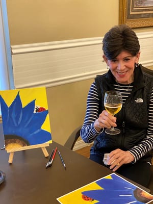 Resident painting during an activity session