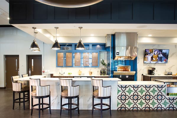 Interior view of the facility's amenity space with a bar area