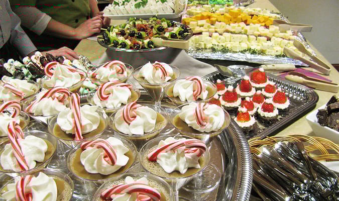 A display of festive desserts with candy canes