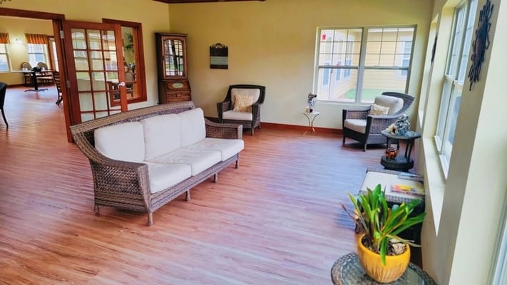 A cozy common area with seating and natural light